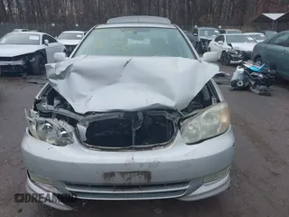 2003 Toyota Corolla CE with VIN 2T1BR38EX3C119765, listed as a IAAI auction lot 41053838 with 147,872 mi miles and . Bid and sale history available at DreamBid. Image 12.