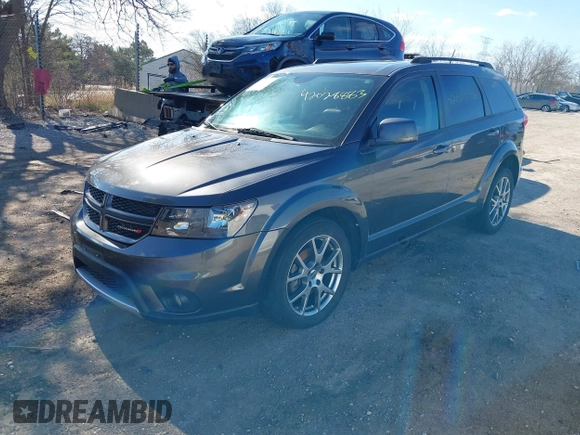 2016 Dodge Journey R/T with VIN 3C4PDDEG5GT242473, listed as a IAAI auction lot 42028883 with 64,117 mi miles and . Bid and sale history available at DreamBid. Image 2.
