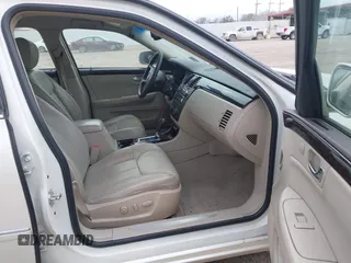2008 Cadillac DTS w/1SD with VIN 1G6KD57Y28U200858, listed as a IAAI auction lot 41330235 with 103,446 mi miles. Bid and sale history available at carsss.com. Image 5.