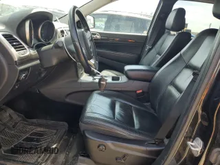 2013 Jeep Grand Cherokee Laredo with VIN 1C4RJFAG2DC604589, listed as a Copart auction lot 54268625 with 186,746 mi miles and Non Repairable. Bid and sale history available at carsss.com. Image 7.