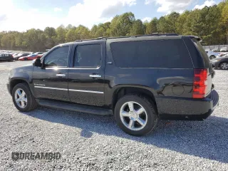 2013 Chevrolet Suburban LTZ with VIN 1GNSCKE0XDR364889, listed as a Copart auction lot 77598334 with 161,656 mi miles and Salvage Title. Bid and sale history available at carsss.com. Image 2.