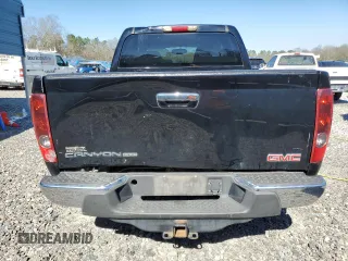 2012 GMC Canyon SLE1 with VIN 1GTD5MFE5C8105815, listed as a Copart auction lot 49130365 with 116,576 mi miles and Salvage Title. Bid and sale history available at carsss.com. Image 6.