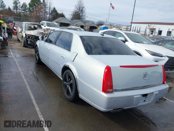2006 Cadillac DTS w/1SC with VIN 1G6KD57Y56U101903, listed as a IAAI auction lot 41710160 with 151,057 mi miles. Bid and sale history available at carsss.com. Image 3.