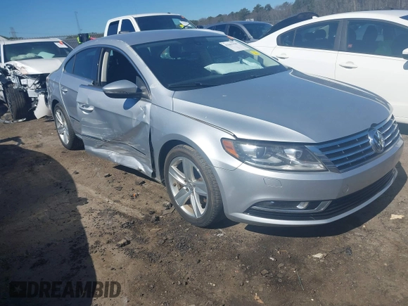 2013 Volkswagen CC Sport with VIN WVWBN7AN3DE553523, listed as a IAAI auction lot 41661320 with 95,085 mi miles and . Bid and sale history available at DreamBid. Image 1.