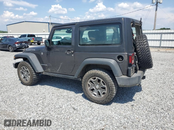 2017 Jeep Wrangler Rubicon with VIN 1C4BJWCG0HL675472, listed as a Copart auction lot 62751365 with 86,338 mi miles and Salvage title. Bid and sale history available at DreamBid. Image 2.
