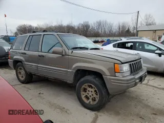 1997 Jeep Grand Cherokee Limited with VIN 1J4GZ78Y3VC568413, listed as a Copart auction lot 86171124 with 104,558 mi miles and Salvage Title. Bid and sale history available at carsss.com. Image 4.