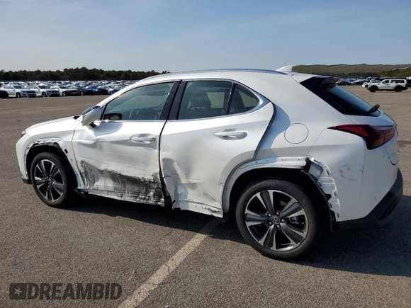 2025 Lexus UX with VIN JTHUCJDH6S2007491, listed as a Copart auction lot 52997175 with 1,042 mi miles and Salvage Title. Bid and sale history available at carsss.com. Image 2.