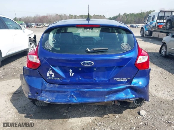 2012 Ford Focus Titanium with VIN 1FAHP3N23CL433041, listed as a IAAI auction lot 41710341 with NaN miles. Bid and sale history available at carsss.com. Image 16.