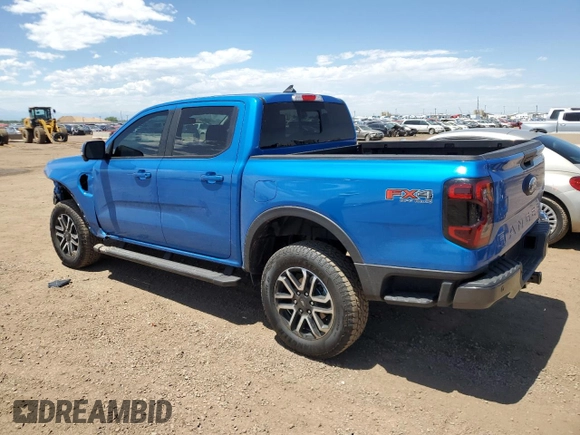 2025 Ford Ranger Lariat with VIN 1FTER4KH9SLE17446, listed as a Copart auction lot 61853775 with 1,810 mi miles and Salvage title. Bid and sale history available at DreamBid. Image 2.