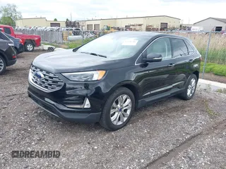 2020 Ford Edge Titanium with VIN 2FMPK4K94LBA22657, listed as a IAAI auction lot 42340706 with 62,857 mi miles and . Bid and sale history available at DreamBid. Image 2.