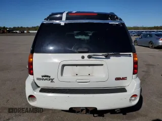 2003 GMC Envoy SLT z VIN 1GKET16S736179347, wystawiony jako Copart lot #52370775 z przebiegiem 230 623 mil mil oraz Szkoda całkowita • Salvage title. Historia ofert i sprzedaży dostępna na DreamBid. Obrazek 6.