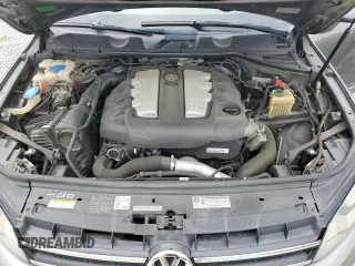 2012 Volkswagen Touareg Sport with VIN WVGFK9BP4CD001860, listed as a Copart auction lot 55090375 with 153,456 mi miles and Salvage title. Bid and sale history available at DreamBid. Image 12.