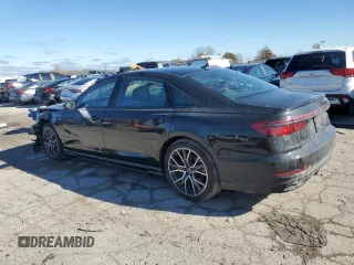 2021 Audi A8 with VIN WAU8EAF83MN020949, listed as a Copart auction lot 77005314 with 13,285 mi miles and Salvage Title. Bid and sale history available at carsss.com. Image 2.