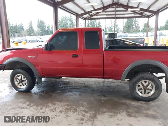 1999 Ford Ranger XL with VIN 1FTZR15VXXPB34362, listed as a IAAI auction lot 41592852 with 247,015 mi miles. Bid and sale history available at carsss.com. Image 14.
