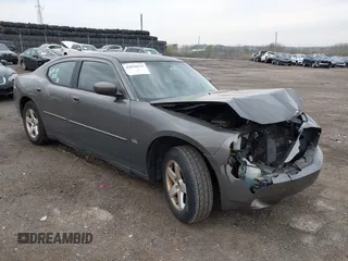 2010 Dodge Charger SXT with VIN 2B3CA3CV7AH165769, listed as a IAAI auction lot 42038135 with 200,886 mi miles. Bid and sale history available at carsss.com. Image 1.