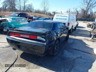 2013 Dodge Challenger R/T with VIN 2C3CDYBT8DH604893, listed as a IAAI auction lot 41585963 with 62,653 mi miles. Bid and sale history available at carsss.com. Image 4.