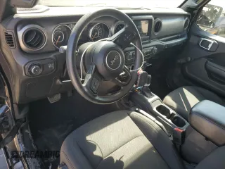 2023 Jeep Wrangler Sport with VIN 1C4HJXAG3PW618988, listed as a Copart auction lot 71615934 with 34,342 mi miles and Salvage title. Bid and sale history available at DreamBid. Image 8.