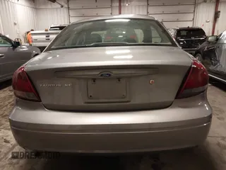 2006 Ford Taurus SE with VIN 1FAFP53U86A113947, listed as a IAAI auction lot 41753927 with 203,867 mi miles. Bid and sale history available at carsss.com. Image 16.