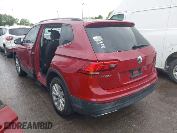 2018 Volkswagen Tiguan S with VIN 3VV0B7AX3JM095118, listed as a IAAI auction lot 42319834 with 100,759 mi miles and . Bid and sale history available at DreamBid. Image 3.