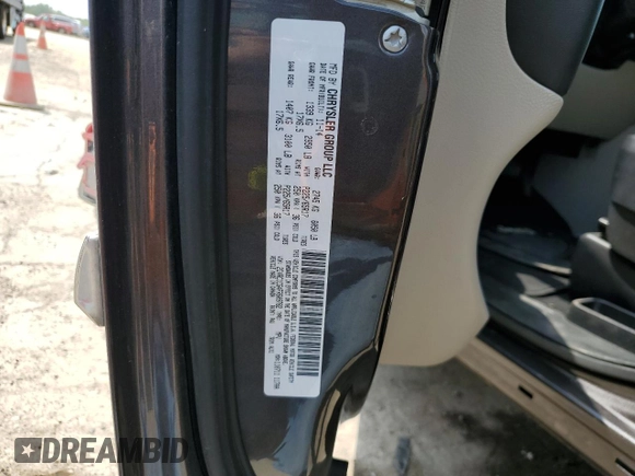 2015 Chrysler Town & Country Touring L with VIN 2C4RC1CG4FR609782, listed as a Copart auction lot 59926354 with 117,123 mi miles and Salvage Title. Bid and sale history available at DreamBid. Image 12.