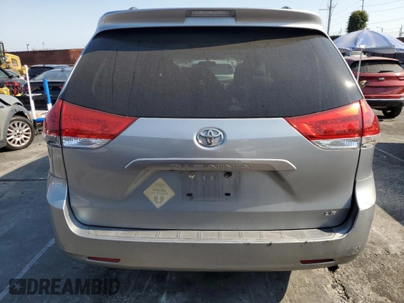 2011 Toyota Sienna LE AAS with VIN 5TDKK3DC6BS054847, listed as a Copart auction lot 64673975 with 197,266 mi miles and Salvage title. Bid and sale history available at DreamBid. Image 6.