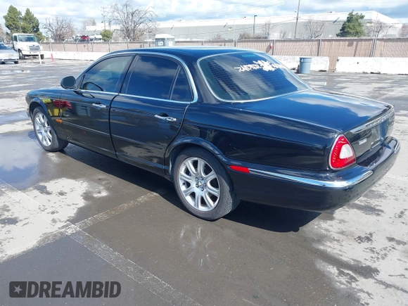 2004 Jaguar XJ with VIN SAJEA74C94SG11224, listed as a IAAI auction lot 41732975 with 204,815 mi miles and . Bid and sale history available at DreamBid. Image 3.