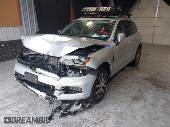 2011 Volkswagen Touareg Exec with VIN WVGFK9BP4BD005986, listed as a IAAI auction lot 41183877 with 109,005 mi miles and . Bid and sale history available at DreamBid. Image 17.
