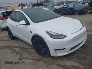 2022 Tesla Model Y Performance with VIN 7SAYGDEF0NF400560, listed as a IAAI auction lot 41783912 with 36,513 mi miles and . Bid and sale history available at DreamBid. Image 1.