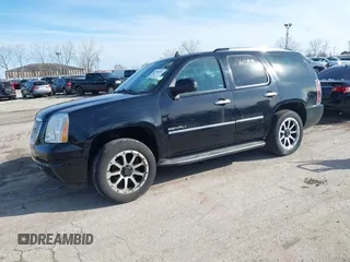 2013 GMC Yukon Denali with VIN 1GKS2EEF7DR347893, listed as a IAAI auction lot 41856088 with 126,213 mi miles. Bid and sale history available at carsss.com. Image 2.