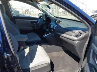 2018 Honda CR-V LX with VIN 2HKRW5H31JH400350, listed as a IAAI auction lot 41841871 with 74,231 mi miles. Bid and sale history available at carsss.com. Image 5.