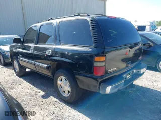 2004 GMC Yukon SLT with VIN 1GKEC13Z44J328264, listed as a IAAI auction lot 41993825 with 267,247 mi miles. Bid and sale history available at carsss.com. Image 3.