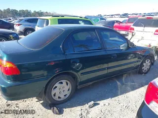 1999 Honda Civic VP with VIN 2HGEJ6616XH515145, listed as a IAAI auction lot 41299003 with 209,375 mi miles. Bid and sale history available at carsss.com. Image 13.