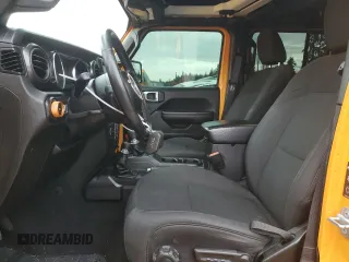 2021 Jeep Wrangler Unlimited Willys with VIN 1C4HJXDMXMW658305, listed as a Copart auction lot 85658534 with 65,653 mi miles and Salvage title. Bid and sale history available at DreamBid. Image 7.