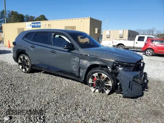 2023 BMW XM z VIN 5YM23CS03P9S57455, wystawiony jako Copart lot #87658815 z przebiegiem Nie podano mil oraz Szkoda całkowita • Salvage title. Historia ofert i sprzedaży dostępna na DreamBid. Obrazek 4.