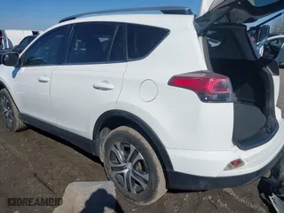 2017 Toyota RAV4 LE with VIN JTMZFREV8HJ111318, listed as a IAAI auction lot 41649660 with 117,018 mi miles. Bid and sale history available at carsss.com. Image 3.