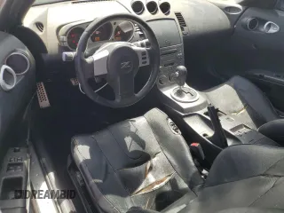 2003 Nissan 350Z Touring z VIN JN1AZ34EX3T016911, wystawiony jako Copart lot #54019395 z przebiegiem 163 228 mil mil oraz Czysty tytuł • Clean title. Historia ofert i sprzedaży dostępna na DreamBid. Obrazek 8.