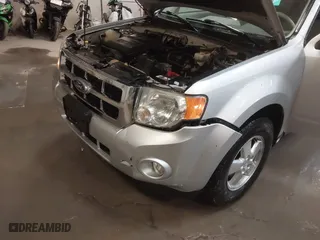2010 Ford Escape XLT with VIN 1FMCU0DG5AKB02811, listed as a IAAI auction lot 41749335 with 103,071 mi miles. Bid and sale history available at carsss.com. Image 6.