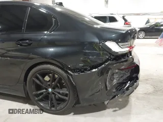 2021 BMW 3 Series M340i xDrive z VIN 3MW5U9J09M8B91584, wystawiony jako IAAI lot #42203384 z przebiegiem 42 688 mil mil oraz . Historia ofert i sprzedaży dostępna na DreamBid. Obrazek 17.