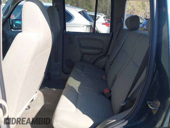 2005 Jeep Liberty Sport with VIN 1J4GL48K05W584675, listed as a IAAI auction lot 41867491 with 112,882 mi miles. Bid and sale history available at carsss.com. Image 8.