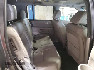 2013 Honda Pilot Touring z VIN 5FNYF3H91DB034638, wystawiony jako Copart lot #59858755 z przebiegiem 115 445 mil mil oraz Szkoda całkowita • Salvage title. Historia ofert i sprzedaży dostępna na DreamBid. Obrazek 11.