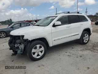 2013 Jeep Grand Cherokee Laredo with VIN 1C4RJEAG4DC517044, listed as a Copart auction lot 51250875 with 150,388 mi miles and Salvage Title. Bid and sale history available at carsss.com. Image 1.