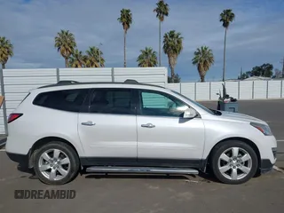 2016 Chevrolet Traverse LT with VIN 1GNKVGKD3GJ108207, listed as a IAAI auction lot 41863277 with 92,915 mi miles and . Bid and sale history available at DreamBid. Image 13.