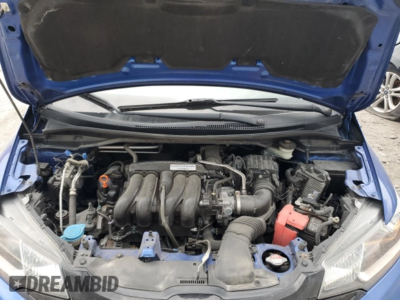 2017 Honda Fit LX with VIN 3HGGK5H55HM703996, listed as a Copart auction lot 61653735 with 77,028 mi miles and Salvage title. Bid and sale history available at DreamBid. Image 11.