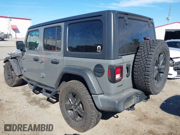 2021 Jeep Wrangler Unlimited Willys with VIN 1C4HJXDM6MW587152, listed as a IAAI auction lot 41687729 with 59,730 mi miles and . Bid and sale history available at DreamBid. Image 3.