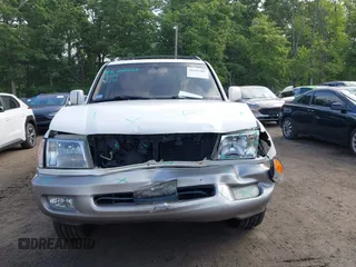 2000 Toyota Land Cruiser z VIN JT3HT05J4Y0084531, wystawiony jako IAAI lot #42381507 z przebiegiem 184 478 mil mil oraz . Historia ofert i sprzedaży dostępna na DreamBid. Obrazek 13.