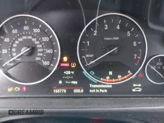 2014 BMW 3 Series 328i xDrive with VIN WBA3B5G56ENS06534, listed as a IAAI auction lot 41549553 with 165,779 mi miles and . Bid and sale history available at DreamBid. Image 7.