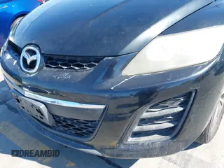 2010 Mazda CX-7 Touring with VIN JM3ER4WL5A0307130, listed as a IAAI auction lot 41659798 with 142,342 mi miles. Bid and sale history available at carsss.com. Image 6.