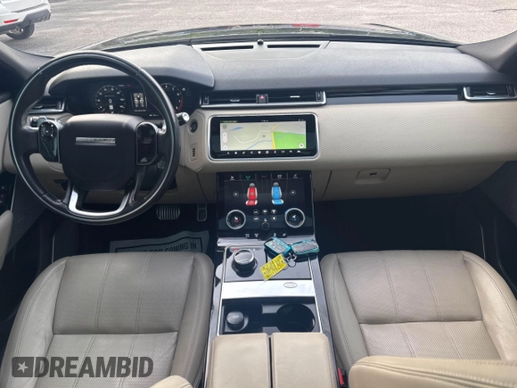 2018 Land Rover Range Rover Velar R-Dynamic SE z VIN SALYL2RX7JA715416, wystawiony jako IAAI lot #42533511 z przebiegiem 123 921 mil mil oraz . Historia ofert i sprzedaży dostępna na DreamBid. Obrazek 6.