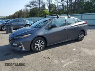 2021 Toyota Prius LE with VIN JTDKAMFP3M3166034, listed as a Copart auction lot 63271275 with 52,536 mi miles and Salvage title. Bid and sale history available at DreamBid. Image 1.