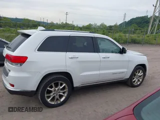 2014 Jeep Grand Cherokee Summit z VIN 1C4RJFJTXEC346627, wystawiony jako IAAI lot #42332200 z przebiegiem 231 007 mil mil oraz . Historia ofert i sprzedaży dostępna na DreamBid. Obrazek 13.